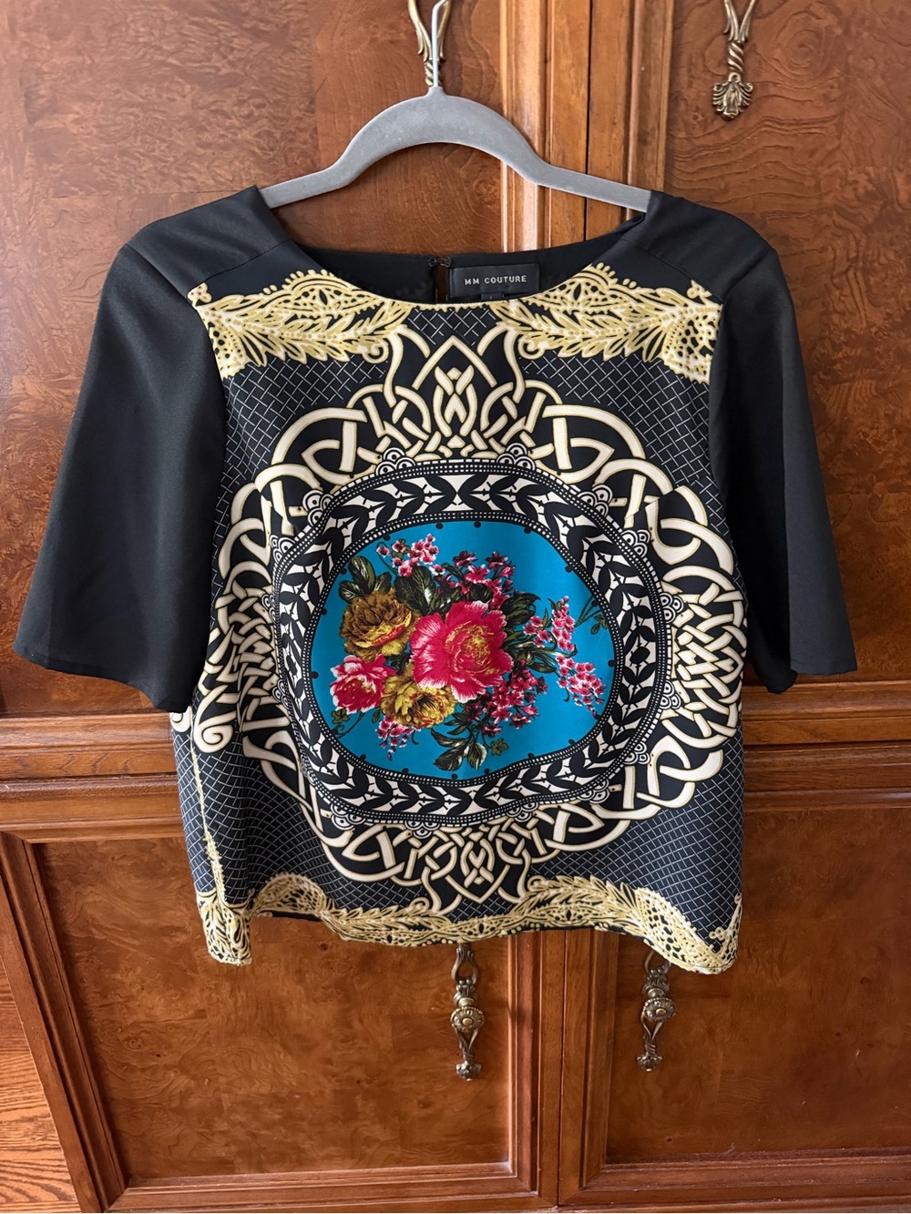 MM Couture Black Top with Turquoise Medallion and Pink Floral Accent